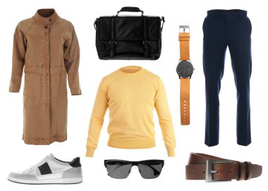 Beyaz arka planda şık kıyafetler. Sonbahar görünümü