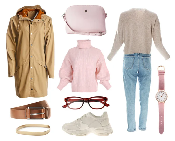 Beyaz arka planda şık kıyafetler. Sonbahar görünümü