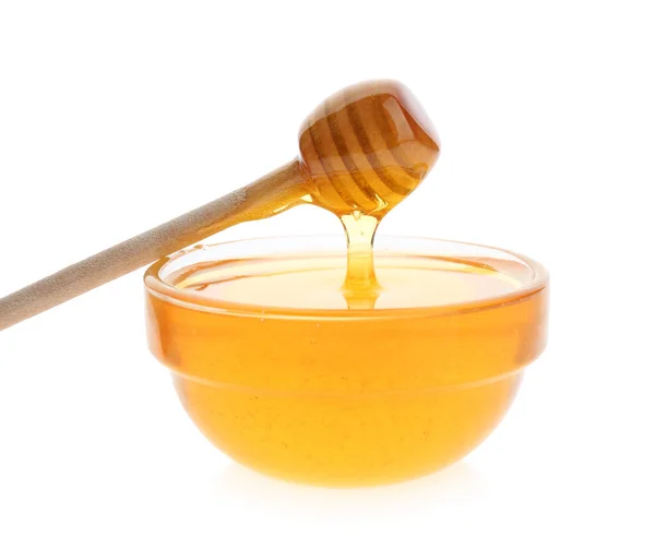 Honig Tropft Vom Löffel Die Schüssel Auf Weißem Hintergrund — Stockfoto
