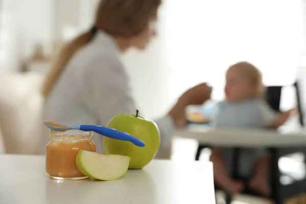 Mother Feeding Her Little Baby Home Focus Healthy Fruit Puree — Stock Photo, Image