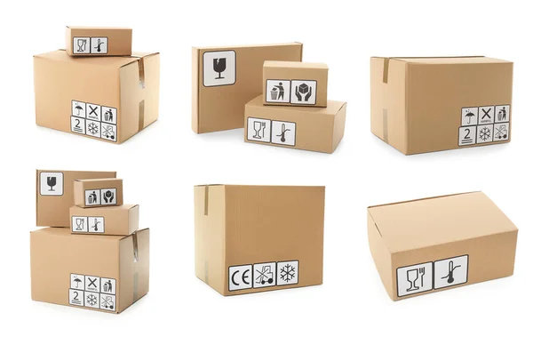 Kartondobozok Fehér Alapon Csomagolási Szimbólumokkal — Stock Fotó