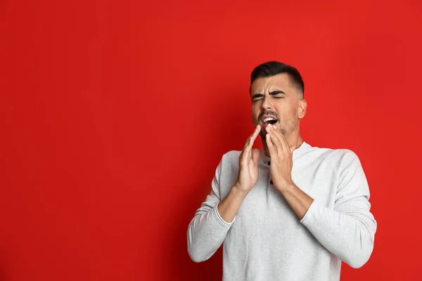 Man Sneezing Red Background Space Text Cold Symptoms — Stock Photo, Image