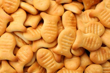 Arka plan olarak lezzetli akvaryum balığı krakerleri, yakın plan görünümü