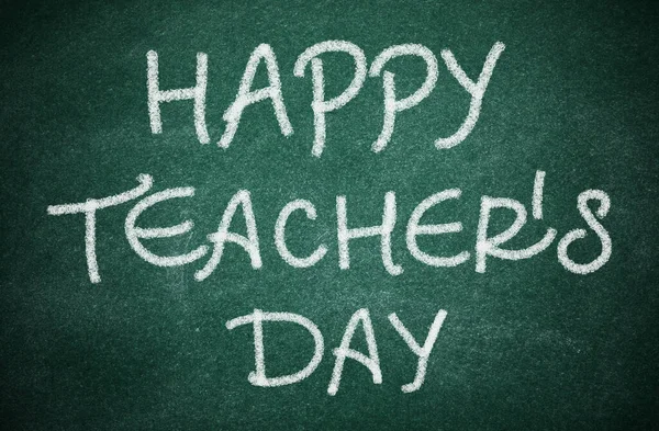 Greeting Happy Teacher\'s Day on green chalkboard