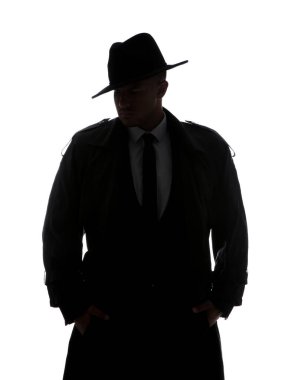 Beyaz arka planda şapkalı eski moda dedektif.