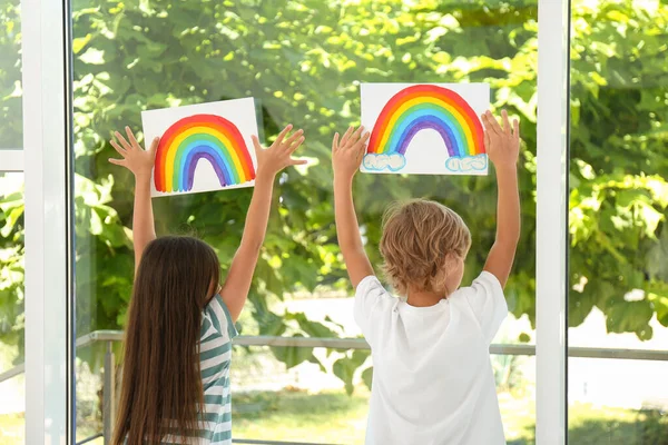 Little Children Holding Rainbow Paintings Window Indoors Back View Stay — Stock Photo, Image