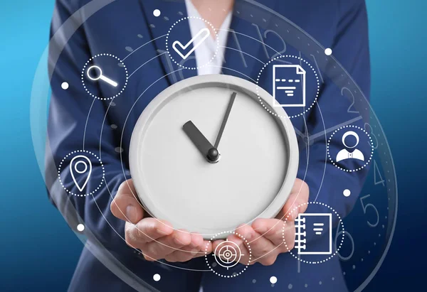 Time Management Concept Woman Holding Clock Surrounded Icons Closeup — Stock Photo, Image