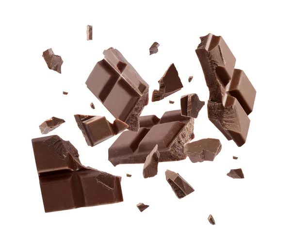 Pedaços Chocolate Leite Caindo Fundo Branco — Fotografia de Stock