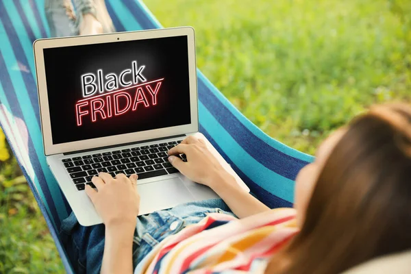 Black Friday Woman Shopping Online Using Laptop Hammock — Stock Photo, Image