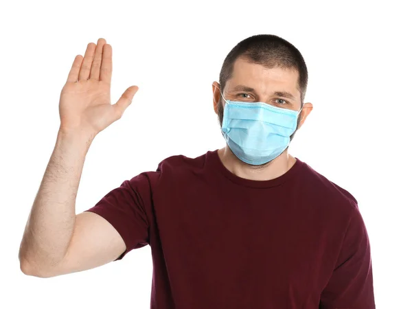 Άντρας Προστατευτική Μάσκα Που Δείχνει Χειρονομία Στάσης Λευκό Φόντο Πρόληψη — Φωτογραφία Αρχείου