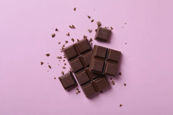 Chocolate Leite Saboroso Fundo Rosa Flat Lay — Fotografia de Stock