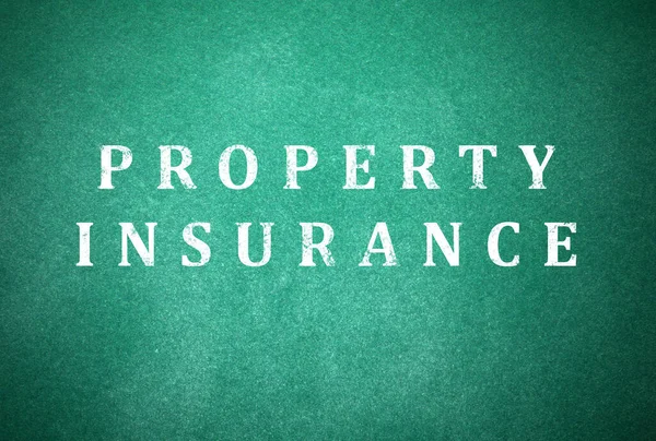 Text Property Insurance written on green chalkboard