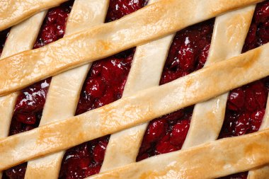 Arka plan olarak nefis taze vişneli turta, üst manzara.
