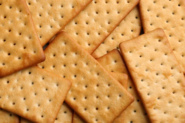 Many Delicious Crackers Background Top View — Stock Photo, Image