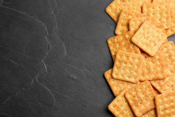 Many Delicious Crackers Black Table Flat Lay Space Text — Stock Photo, Image