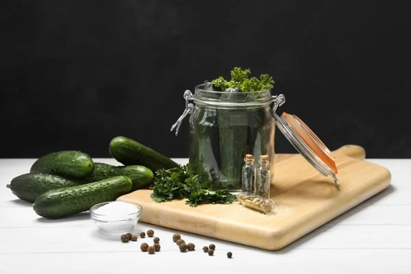 Pickling jar with fresh ripe cucumbers and spices on white wooden table — Stock Image Pickling Jar Fresh Ripe Cucumbers Spices White Wooden Table Stock Photo