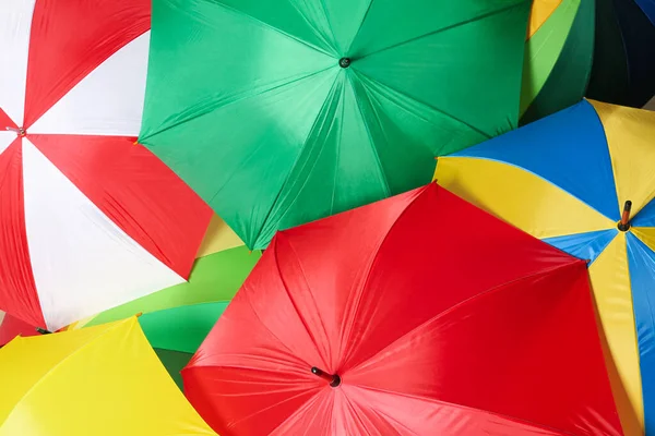 Viele Helle Regenschirme Als Hintergrund Draufsicht — Stockfoto