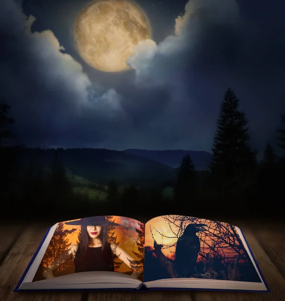 幻想の世界 ページ上の魔女と黒カラスとおとぎ話のオープン本 — ストック写真
