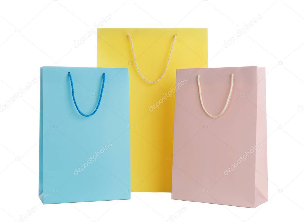 Different paper shopping bags isolated on white