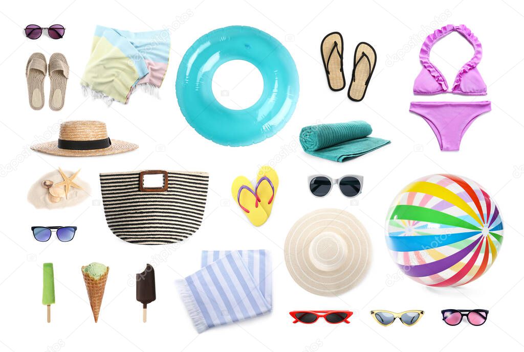 Set with beach accessories on white background