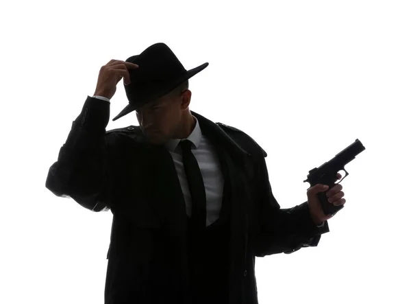 Old fashioned detective with gun on white background