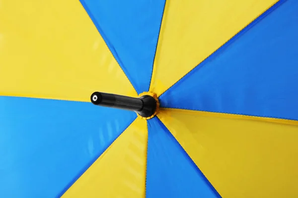 Φωτεινό Κίτρινο Και Μπλε Ομπρέλα Φόντο Closeup — Φωτογραφία Αρχείου
