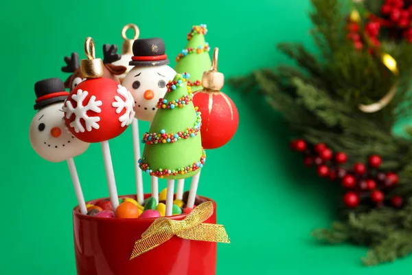 Delicious Christmas Themed Cake Pops Green Background Closeup Space Text — Stock Photo, Image