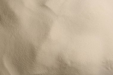Arka plan olarak kuru kumsal kumu, üst manzara
