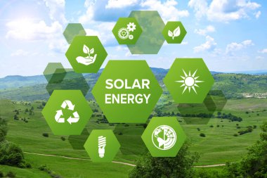 Güneş enerjisi kavramı. Arkaplanda simgeler ve yeşil tepeler olan şema