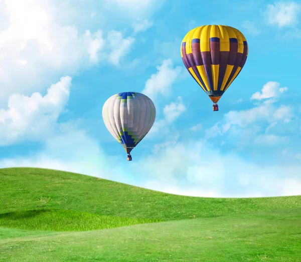 Fantastic Dreams Hot Air Balloons Blue Sky Clouds Green Meadow — Stock Photo, Image