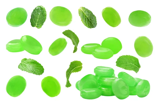 白地にミントハードキャンディーと緑の葉のセット — ストック写真