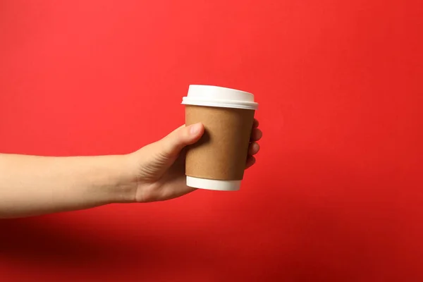 Woman Holding Takeaway Paper Coffee Cup Red Background Closeup — Stock Photo, Image