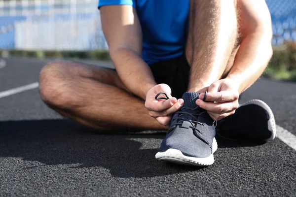 Sporty Man Tying Shoelaces Stadium Sunny Morning Closeup — Stock Photo, Image