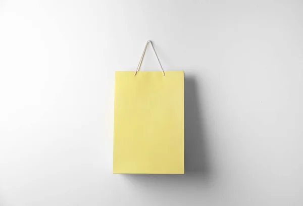 Paper Shopping Bag Hanging White Wall — Stock Photo, Image