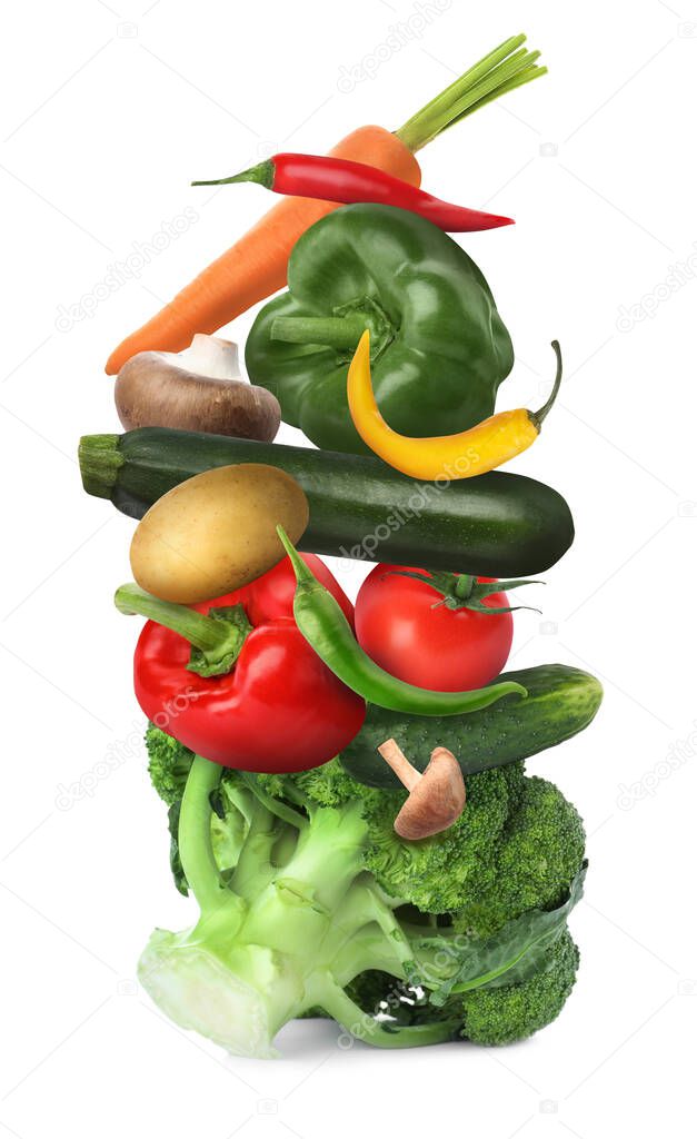 Heap of different fresh vegetables on white background