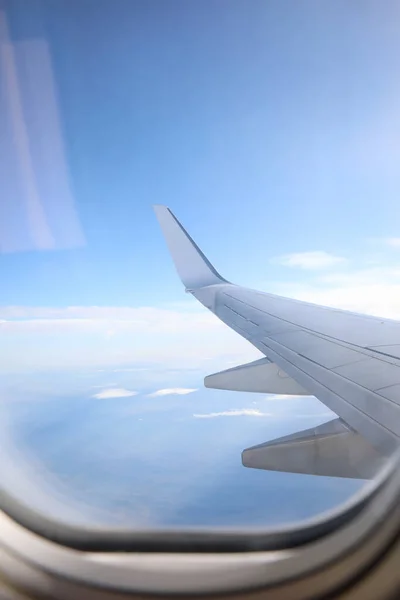 Beautiful view through plane window during flight. Air travel
