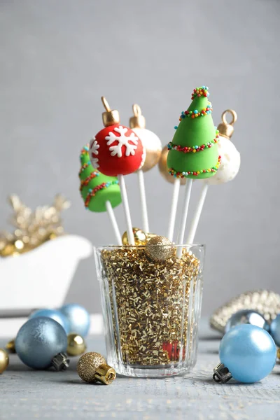 Delicious Christmas Themed Cake Pops Festive Decor Wooden Table Grey — Stock Photo, Image