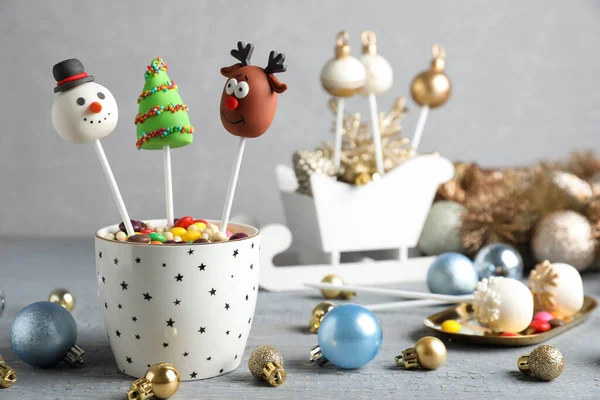 Delicious Christmas Themed Cake Pops Festive Decor Wooden Table Grey — Stock Photo, Image