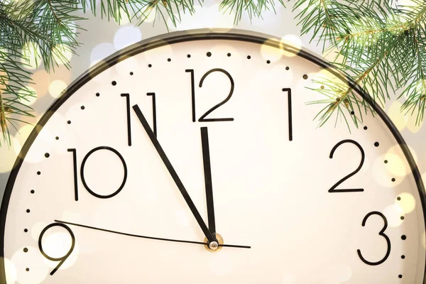 Clock Showing Five Minutes Till Midnight Fir Tree Branches Closeup — Stock Photo, Image