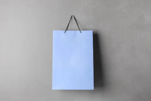 Paper Shopping Bag Hanging Grey Wall — Stock Photo, Image