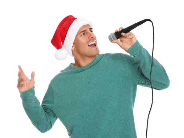 Емоційний Чоловік Капелюсі Санта Клауса Співає Мікрофоном Білому Тлі Різдвяна — стокове фото