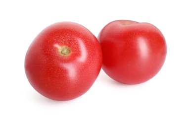 Beyaz renkte iki olgun kırmızı domates.
