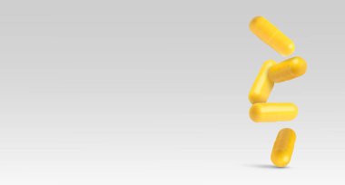 Açık gri arka plana düşen sarı haplar. Metin için alanı olan pankart tasarımı