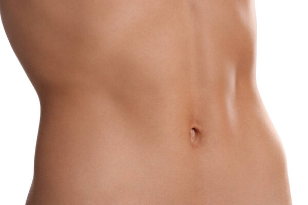 Женщина с плоским животом на белом фоне, крупным планом