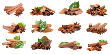 Tarçın çubukları ve toz beyaz üzerine izole edilmiş, set