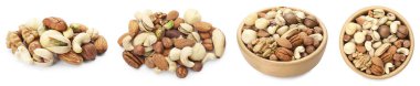 Beyaza izole edilmiş farklı fındıkların karışımı.