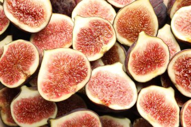 Arkaplan olarak olgun incir parçaları, üst görünüm