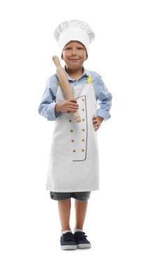 Meslek seçimi. Beyaz arka planda aşçı gibi davranan, oklavalı küçük çocuk.