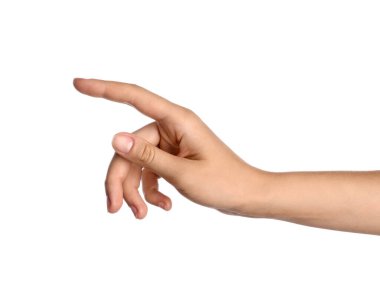 Beyaz arkaplanda bir şeye dokunan kadın, yakın plan.