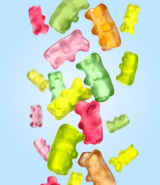 Tatlı jöle şekerlemeleri, açık mavi arka plana düşen ayı şeklinde.